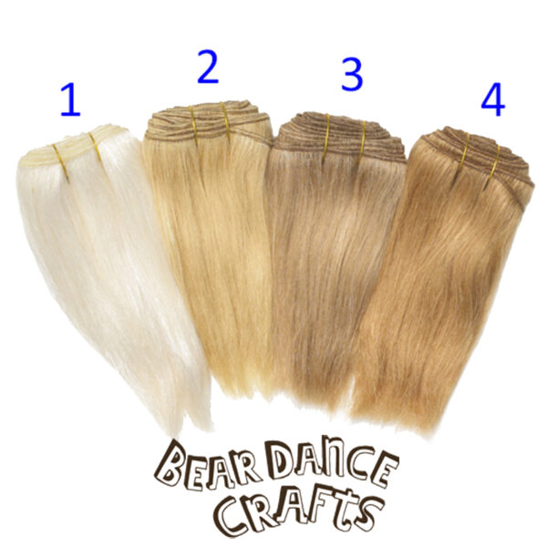 straight weft doll making hair blond, light brown and caramel tones